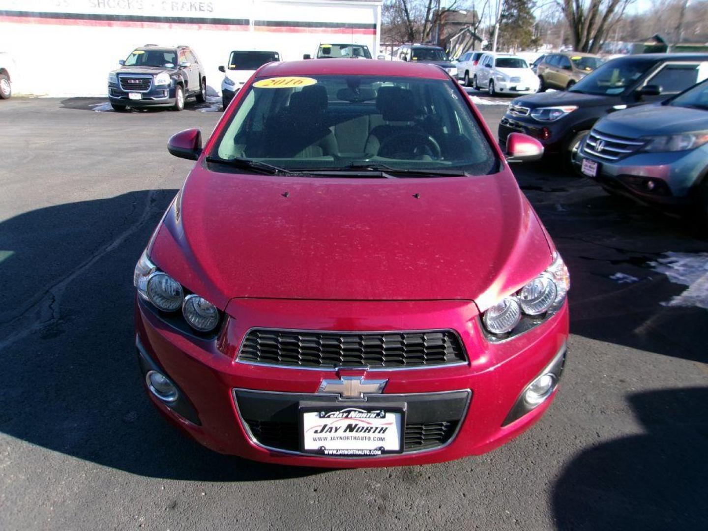 2016 RED CHEVROLET SONIC LT (1G1JC5SH9G4) with an 1.8L engine, Automatic transmission, located at 501 E. Columbia St., Springfield, OH, 45503, (800) 262-7122, 39.925262, -83.801796 - *** 1 Owner *** Serviced and Detailed *** New Tires *** Jay North Auto has offered hand picked vehicles since 1965! Our customer's enjoy a NO pressure buying experience with a small town feel. All of our vehicles get fully inspected and detailed. We are a preferred dealer for many local credit - Photo#2