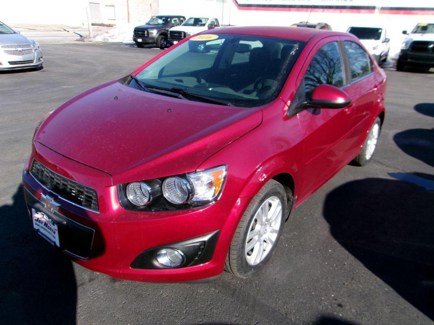 2016 RED CHEVROLET SONIC LT (1G1JC5SH9G4) with an 1.8L engine, Automatic transmission, located at 501 E. Columbia St., Springfield, OH, 45503, (800) 262-7122, 39.925262, -83.801796 - *** 1 Owner *** Serviced and Detailed *** New Tires *** Jay North Auto has offered hand picked vehicles since 1965! Our customer's enjoy a NO pressure buying experience with a small town feel. All of our vehicles get fully inspected and detailed. We are a preferred dealer for many local credit - Photo#3