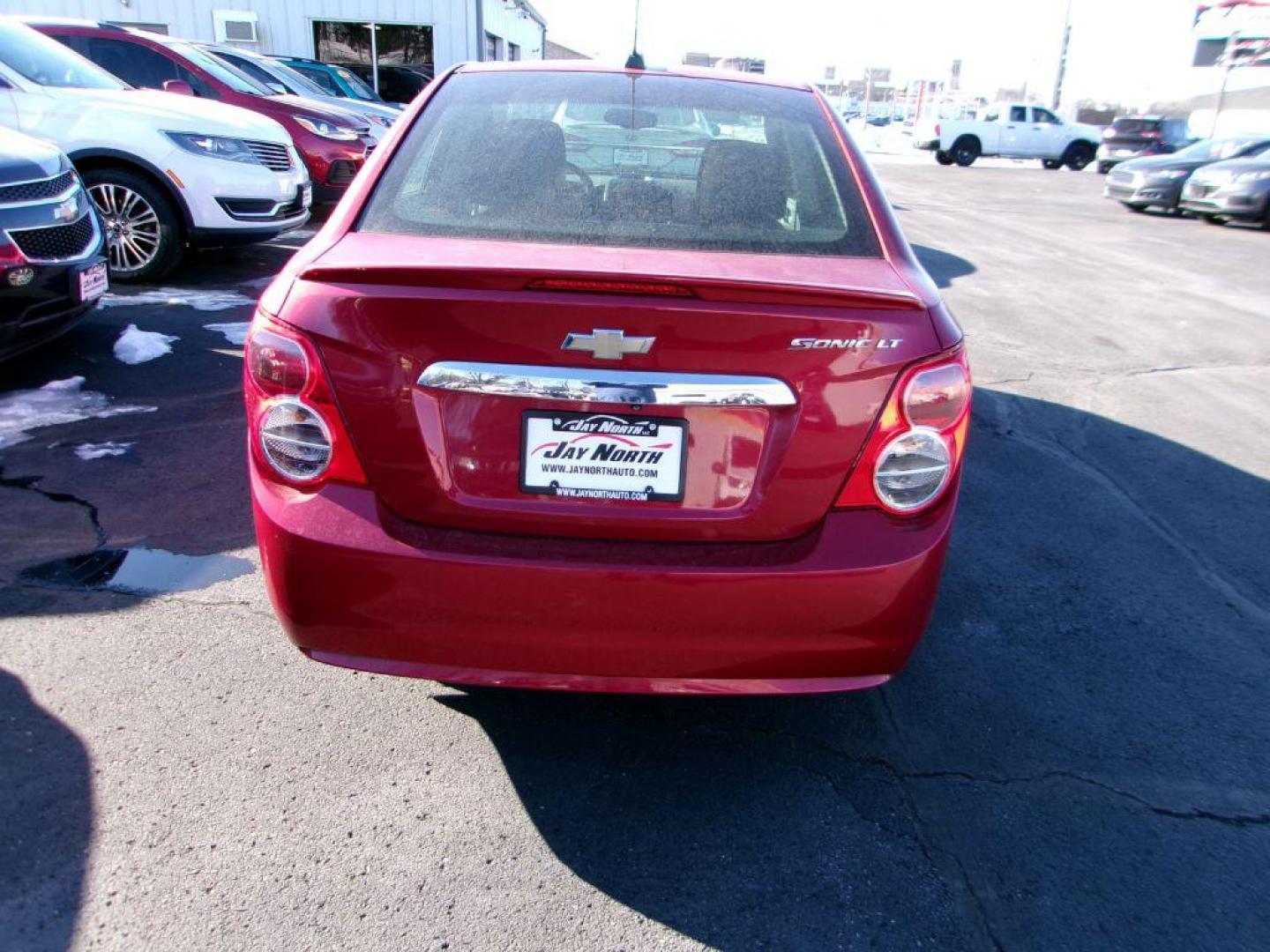 2016 RED CHEVROLET SONIC LT (1G1JC5SH9G4) with an 1.8L engine, Automatic transmission, located at 501 E. Columbia St., Springfield, OH, 45503, (800) 262-7122, 39.925262, -83.801796 - *** 1 Owner *** Serviced and Detailed *** New Tires *** Jay North Auto has offered hand picked vehicles since 1965! Our customer's enjoy a NO pressure buying experience with a small town feel. All of our vehicles get fully inspected and detailed. We are a preferred dealer for many local credit - Photo#5