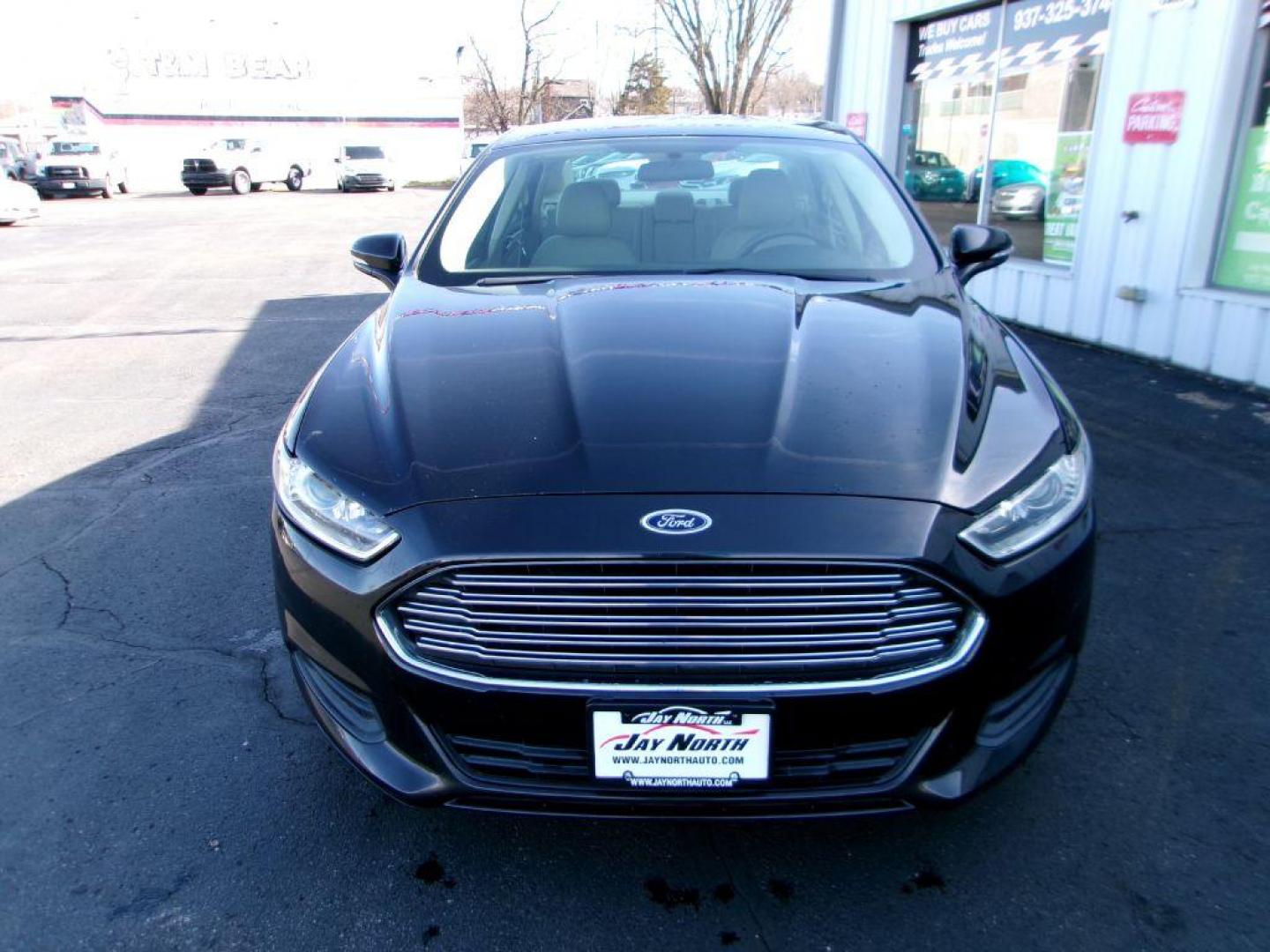 2013 BLACK FORD FUSION SE (3FA6P0H77DR) with an 2.5L engine, Automatic transmission, located at 501 E. Columbia St., Springfield, OH, 45503, (800) 262-7122, 39.925262, -83.801796 - *** New Tires *** SE *** Serviced and Detailed *** 24 Service Records on CarFax *** Jay North Auto has offered hand picked vehicles since 1965! Our customer's enjoy a NO pressure buying experience with a small town feel. All of our vehicles get fully inspected and detailed. We are a preferred d - Photo#2