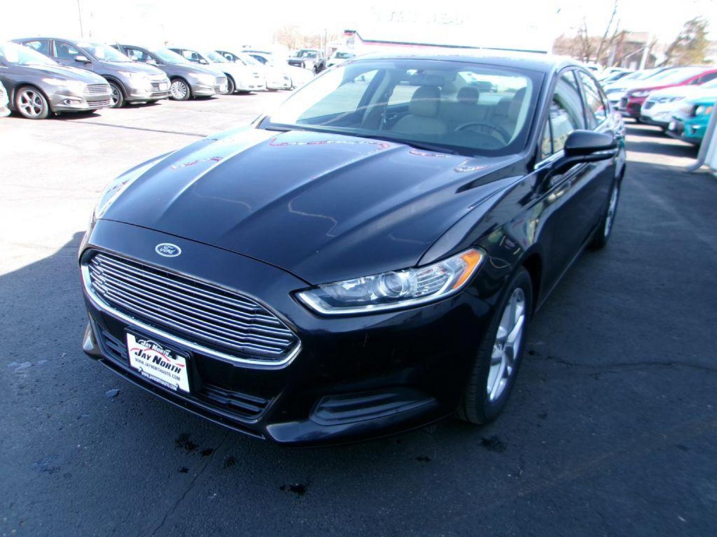 2013 BLACK FORD FUSION SE (3FA6P0H77DR) with an 2.5L engine, Automatic transmission, located at 501 E. Columbia St., Springfield, OH, 45503, (800) 262-7122, 39.925262, -83.801796 - *** New Tires *** SE *** Serviced and Detailed *** 24 Service Records on CarFax *** Jay North Auto has offered hand picked vehicles since 1965! Our customer's enjoy a NO pressure buying experience with a small town feel. All of our vehicles get fully inspected and detailed. We are a preferred d - Photo#6