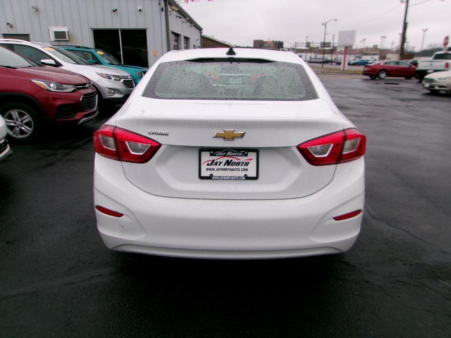 2018 WHITE CHEVROLET CRUZE LS (1G1BC5SM9J7) with an 1.4L engine, Automatic transmission, located at 501 E. Columbia St., Springfield, OH, 45503, (800) 262-7122, 39.925262, -83.801796 - *** New Tires *** LS *** Serviced and Detailed *** Jay North Auto has offered hand picked vehicles since 1965! Our customer's enjoy a NO pressure buying experience with a small town feel. All of our vehicles get fully inspected and detailed. We are a preferred dealer for many local credit union - Photo#4