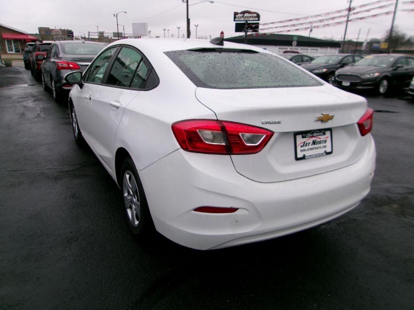 2018 WHITE CHEVROLET CRUZE LS (1G1BC5SM9J7) with an 1.4L engine, Automatic transmission, located at 501 E. Columbia St., Springfield, OH, 45503, (800) 262-7122, 39.925262, -83.801796 - *** New Tires *** LS *** Serviced and Detailed *** Jay North Auto has offered hand picked vehicles since 1965! Our customer's enjoy a NO pressure buying experience with a small town feel. All of our vehicles get fully inspected and detailed. We are a preferred dealer for many local credit union - Photo#5