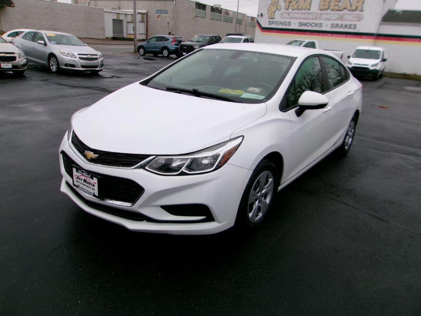 2018 WHITE CHEVROLET CRUZE LS (1G1BC5SM9J7) with an 1.4L engine, Automatic transmission, located at 501 E. Columbia St., Springfield, OH, 45503, (800) 262-7122, 39.925262, -83.801796 - *** New Tires *** LS *** Serviced and Detailed *** Jay North Auto has offered hand picked vehicles since 1965! Our customer's enjoy a NO pressure buying experience with a small town feel. All of our vehicles get fully inspected and detailed. We are a preferred dealer for many local credit union - Photo#6