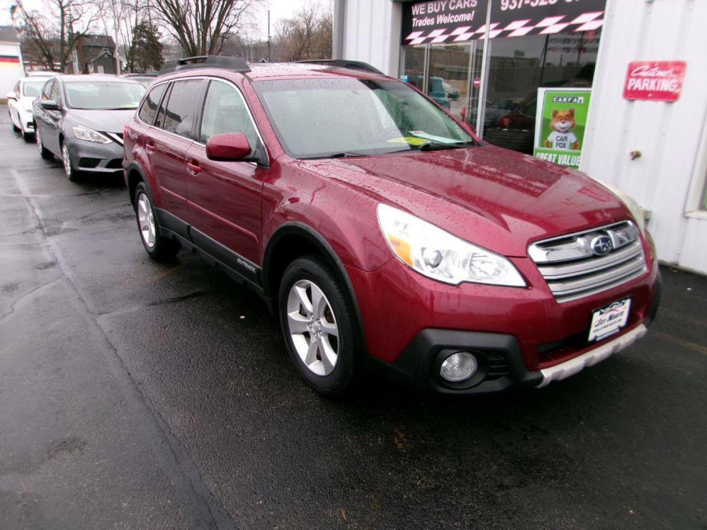 2013 RED SUBARU OUTBACK 3.6R LIMITED (4S4BRDKC1D2) with an 3.6L engine, Continuously Variable transmission, located at 501 E. Columbia St., Springfield, OH, 45503, (800) 262-7122, 39.925262, -83.801796 - *** AWD V6 Limited *** Heated leather Seating *** Moonroof *** Premium Audio *** Serviced and Detailed *** Jay North Auto has offered hand picked vehicles since 1965! Our customer's enjoy a NO pressure buying experience with a small town feel. All of our vehicles get fully inspected and detailed - Photo#2