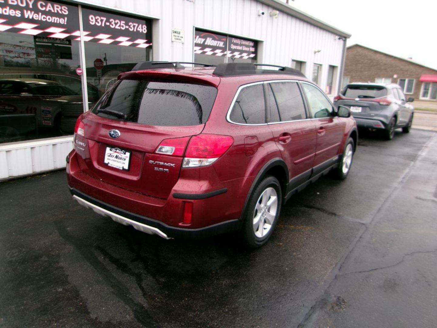 2013 RED SUBARU OUTBACK 3.6R LIMITED (4S4BRDKC1D2) with an 3.6L engine, Continuously Variable transmission, located at 501 E. Columbia St., Springfield, OH, 45503, (800) 262-7122, 39.925262, -83.801796 - *** AWD V6 Limited *** Heated leather Seating *** Moonroof *** Premium Audio *** Serviced and Detailed *** Jay North Auto has offered hand picked vehicles since 1965! Our customer's enjoy a NO pressure buying experience with a small town feel. All of our vehicles get fully inspected and detailed - Photo#3