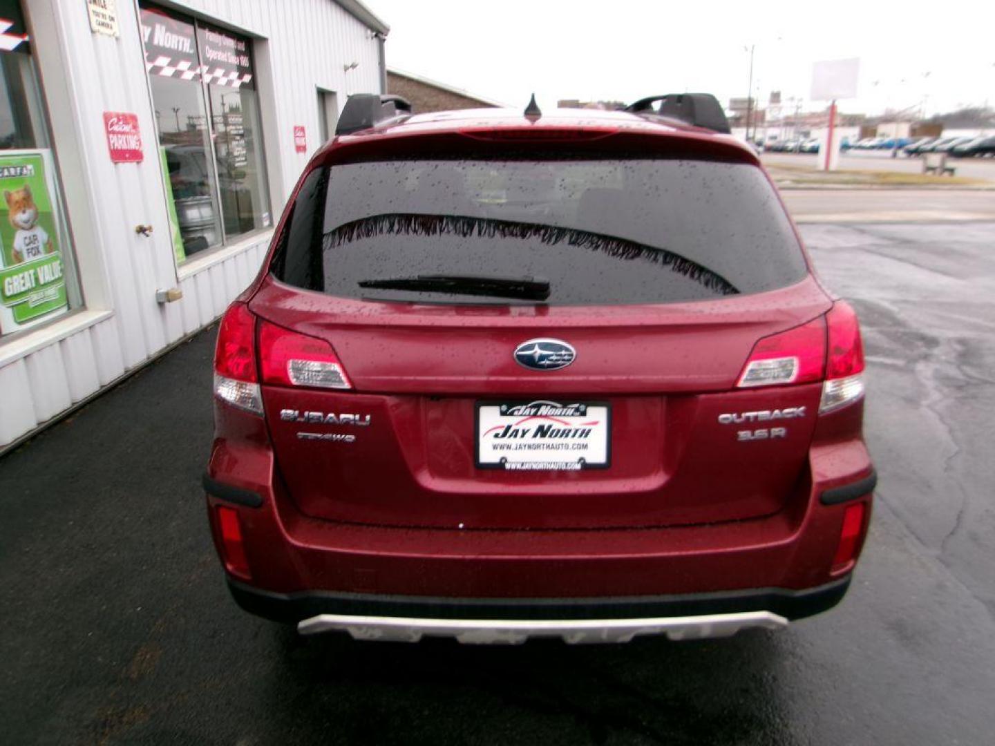 2013 RED SUBARU OUTBACK 3.6R LIMITED (4S4BRDKC1D2) with an 3.6L engine, Continuously Variable transmission, located at 501 E. Columbia St., Springfield, OH, 45503, (800) 262-7122, 39.925262, -83.801796 - *** AWD V6 Limited *** Heated leather Seating *** Moonroof *** Premium Audio *** Serviced and Detailed *** Jay North Auto has offered hand picked vehicles since 1965! Our customer's enjoy a NO pressure buying experience with a small town feel. All of our vehicles get fully inspected and detailed - Photo#4