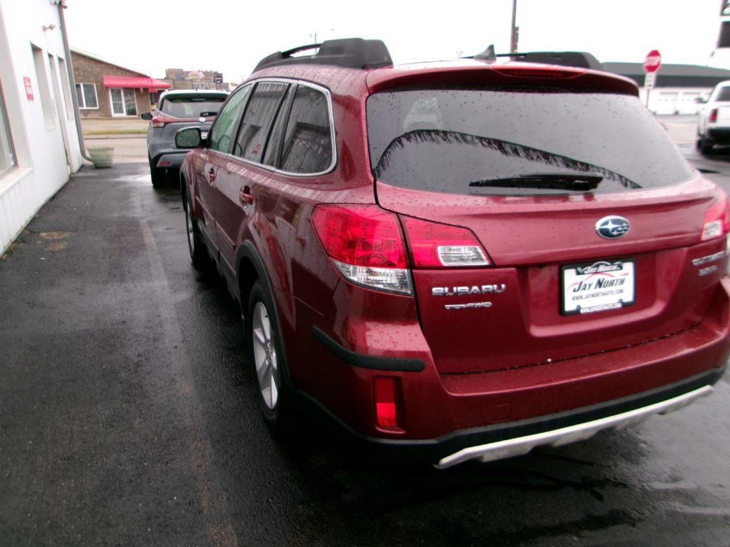 2013 RED SUBARU OUTBACK 3.6R LIMITED (4S4BRDKC1D2) with an 3.6L engine, Continuously Variable transmission, located at 501 E. Columbia St., Springfield, OH, 45503, (800) 262-7122, 39.925262, -83.801796 - *** AWD V6 Limited *** Heated leather Seating *** Moonroof *** Premium Audio *** Serviced and Detailed *** Jay North Auto has offered hand picked vehicles since 1965! Our customer's enjoy a NO pressure buying experience with a small town feel. All of our vehicles get fully inspected and detailed - Photo#5