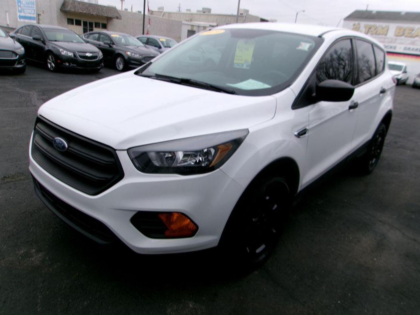 2019 WHITE FORD ESCAPE S (1FMCU0F72KU) with an 2.5L engine, Automatic transmission, located at 501 E. Columbia St., Springfield, OH, 45503, (800) 262-7122, 39.925262, -83.801796 - *** New Tires *** S *** Serviced and Detailed *** FWD *** 2.5L *** Clean CarFax *** Jay North Auto has offered hand picked vehicles since 1965! Our customer's enjoy a NO pressure buying experience with a small town feel. All of our vehicles get fully inspected and detailed. We are a preferred d - Photo#6