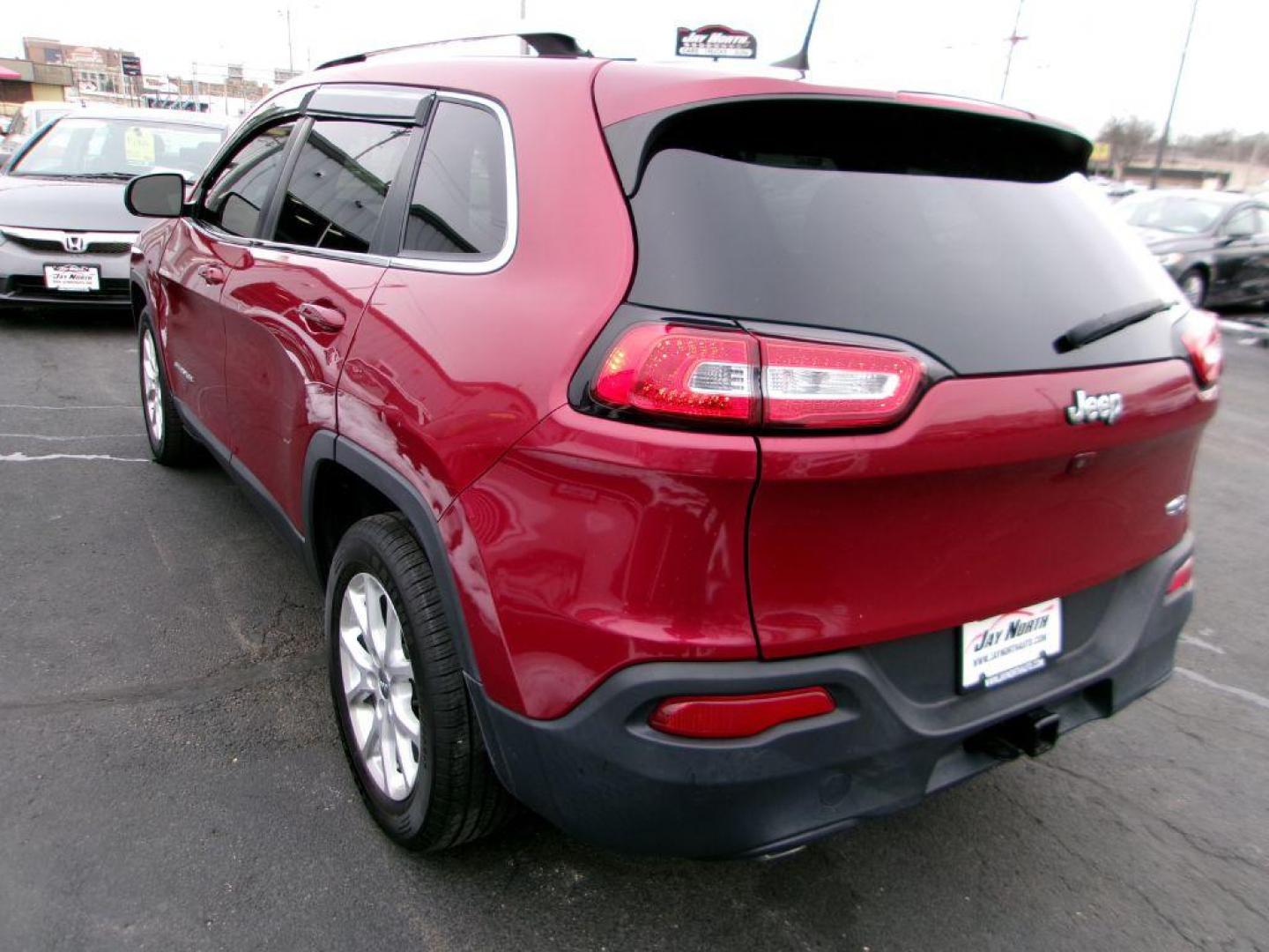 2017 RED JEEP CHEROKEE LATITUDE (1C4PJLCB8HD) with an 2.4L engine, Automatic transmission, located at 501 E. Columbia St., Springfield, OH, 45503, (800) 262-7122, 39.925262, -83.801796 - *** Serviced and Detailed *** Panoramic Moonroof *** FWD *** Comfort / Convenience Group Power 8-Way Driver Seat Power 4-Way Driver Lumbar Adjust Power Liftgate - Photo#3